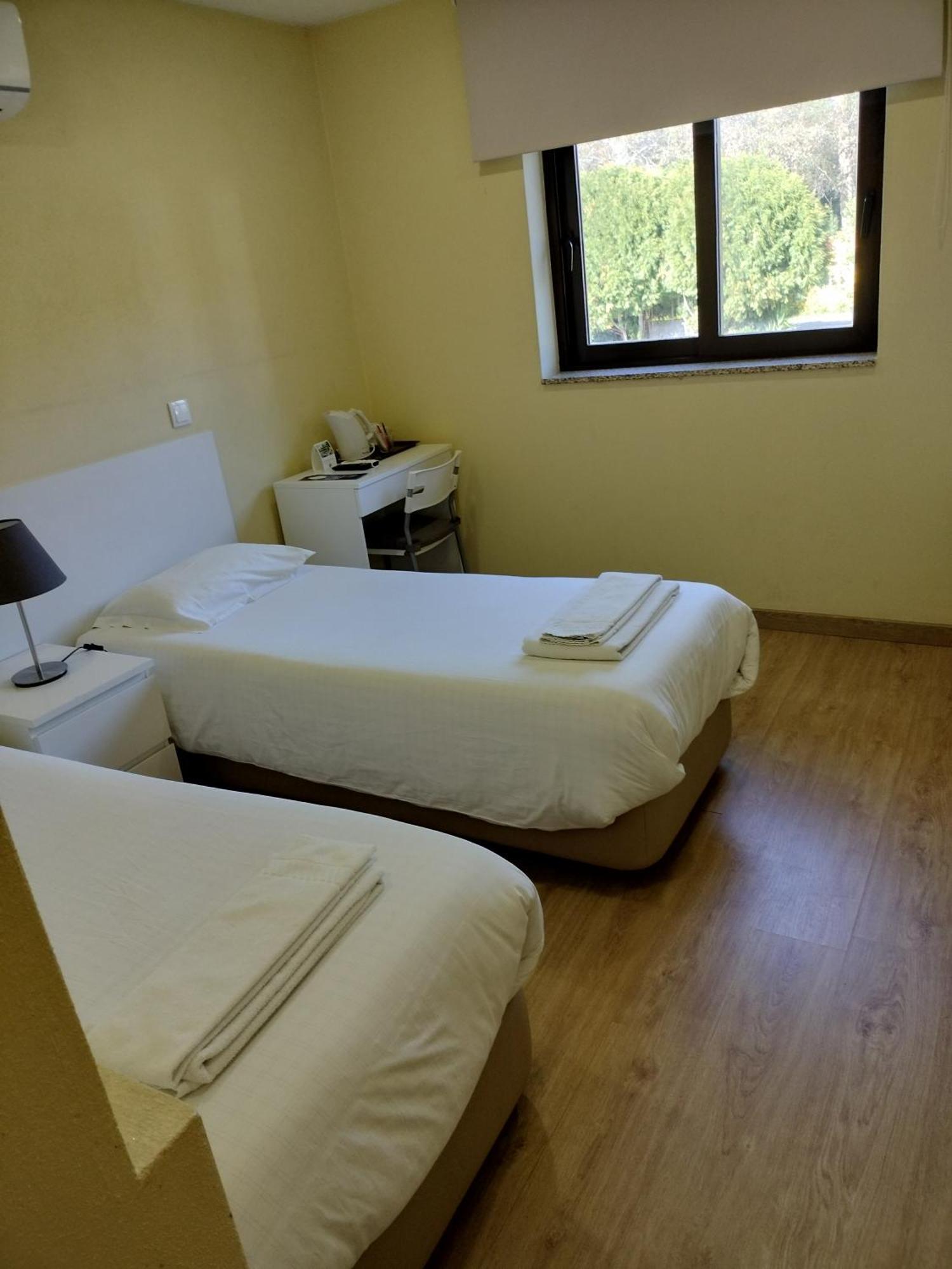 Metro Vilar Suites&Villas Vilar do Pinheiro Habitación foto
